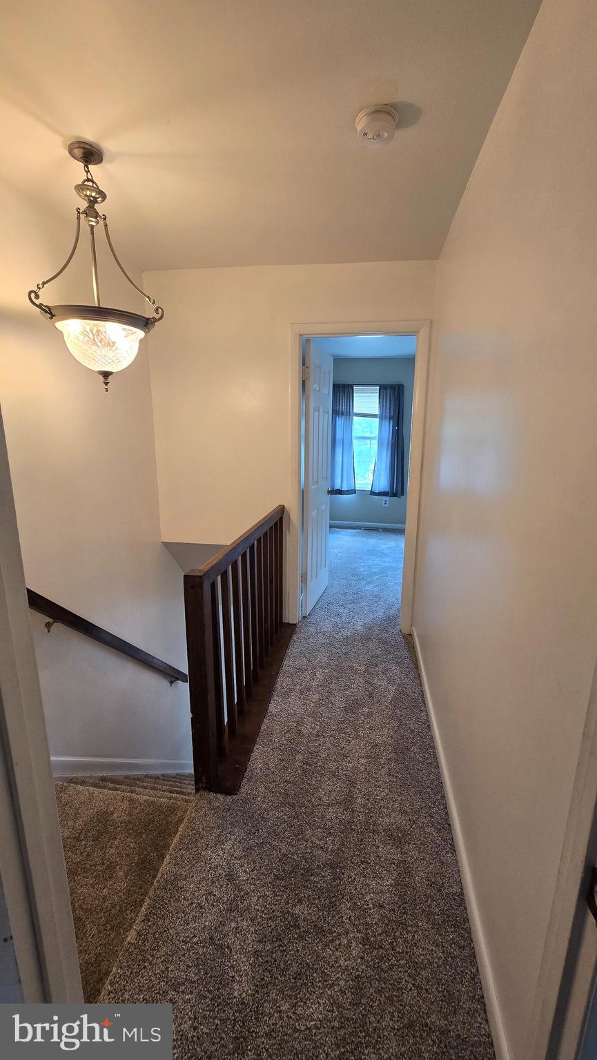 8103 Fenwick Court Laurel, MD 20707 - Photo 11 of 24 Upstairs hallway