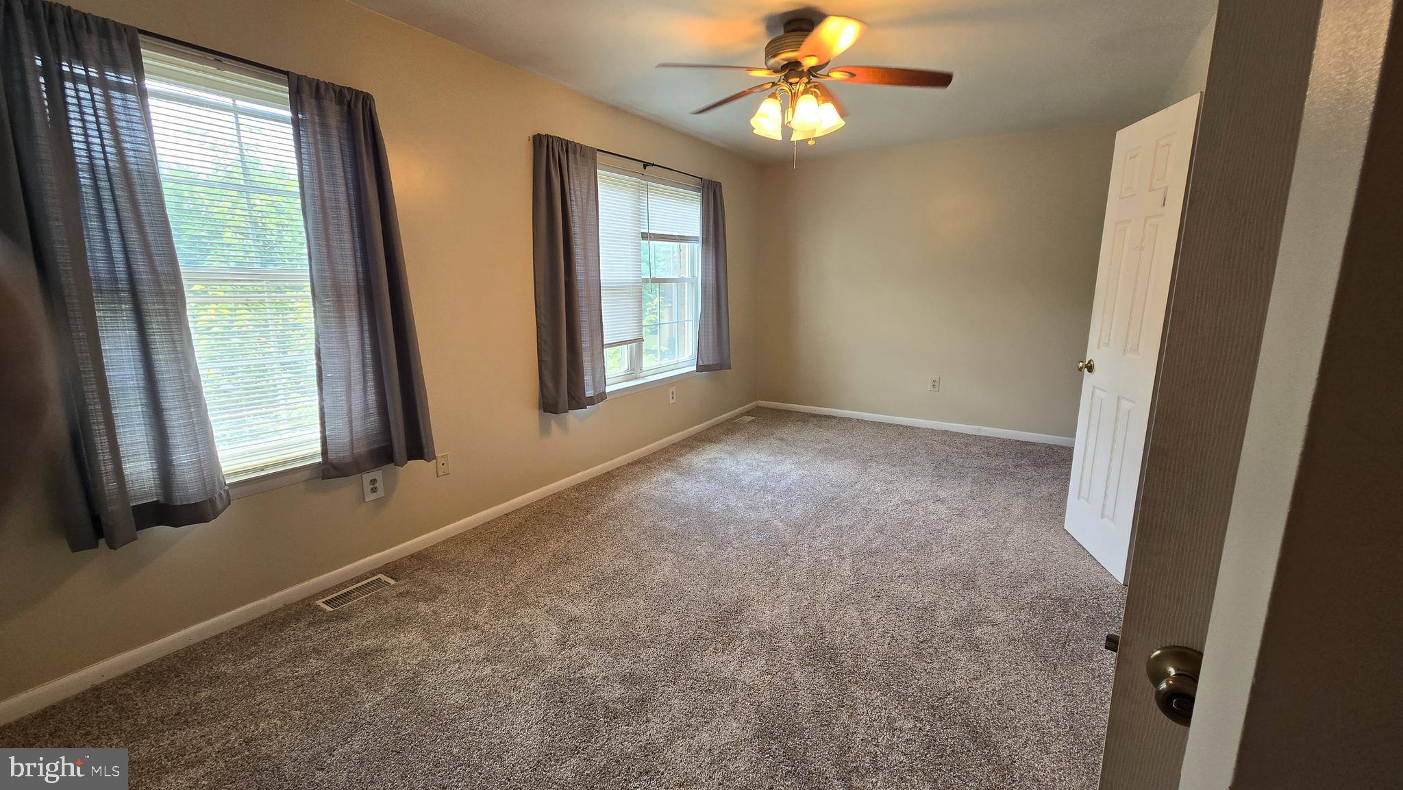 8103 Fenwick Court Laurel, MD 20707 - Photo 12 of 24 Primary Bedroom with Ensuite and Walk-in closet