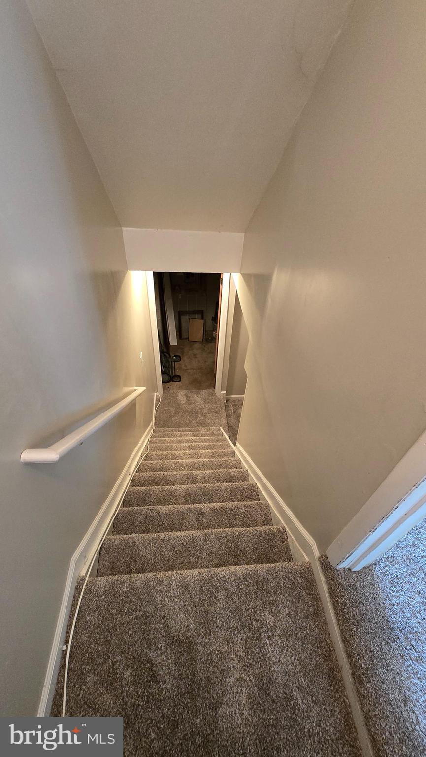 8103 Fenwick Court Laurel, MD 20707 - Photo 18 of 24 Stairs to Rec room and Laundry