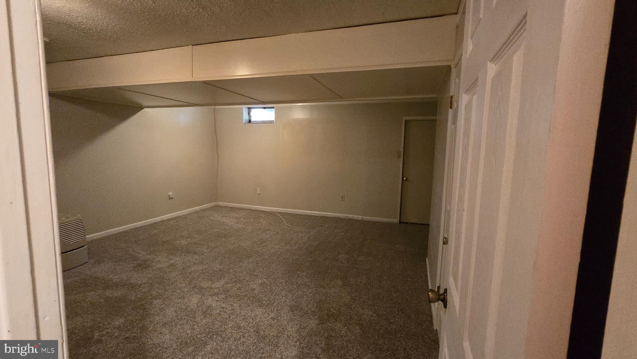 8103 Fenwick Court Laurel, MD 20707 - Photo 19 of 24 Large rec room with bathroom