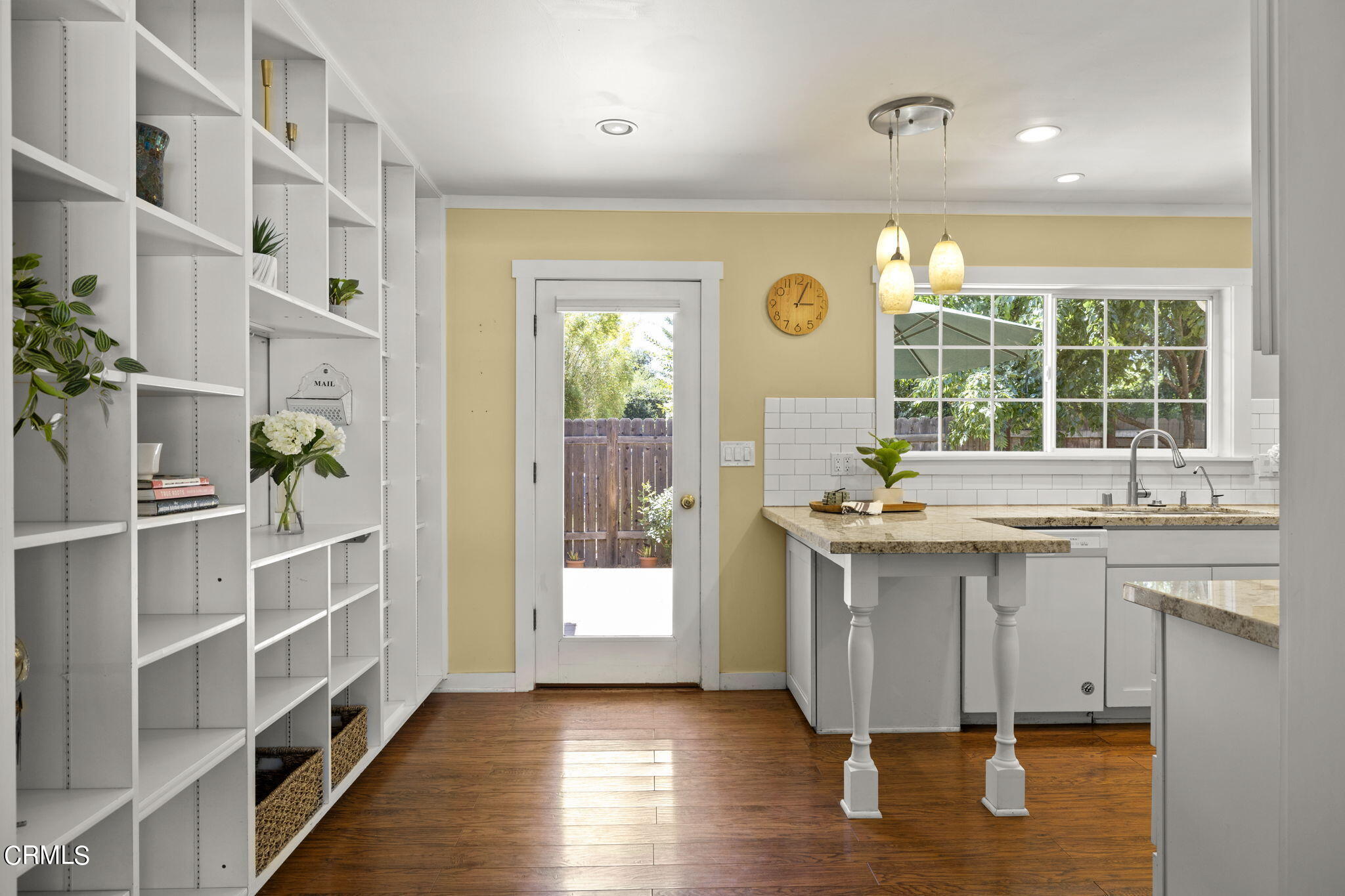 320 Cruzero Street Ojai, CA 93023 - Photo 13 of 48 a kitchen with a sink and cabinets