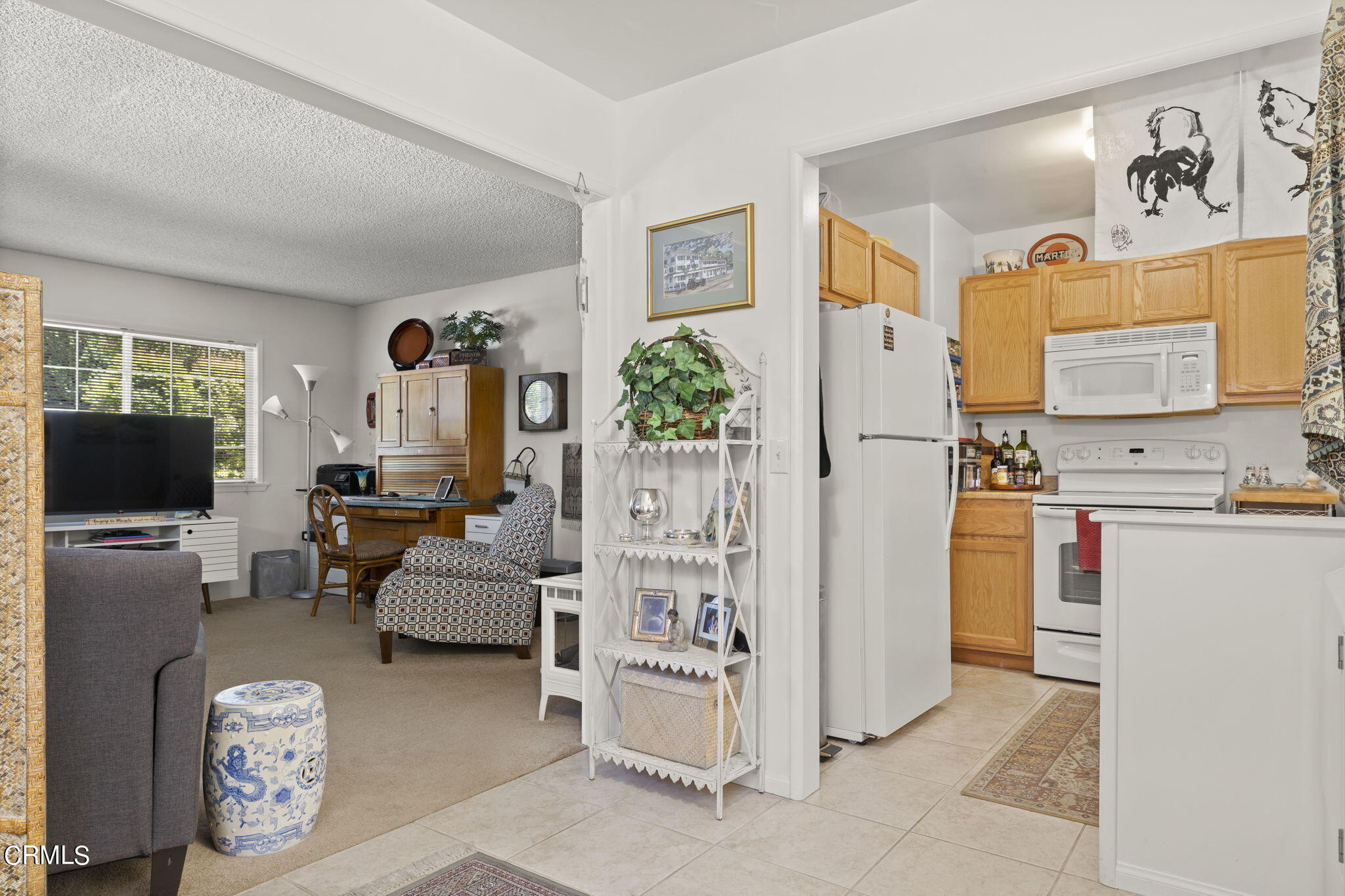 320 Cruzero Street Ojai, CA 93023 - Photo 37 of 48 a living room with furniture and a flat screen tv