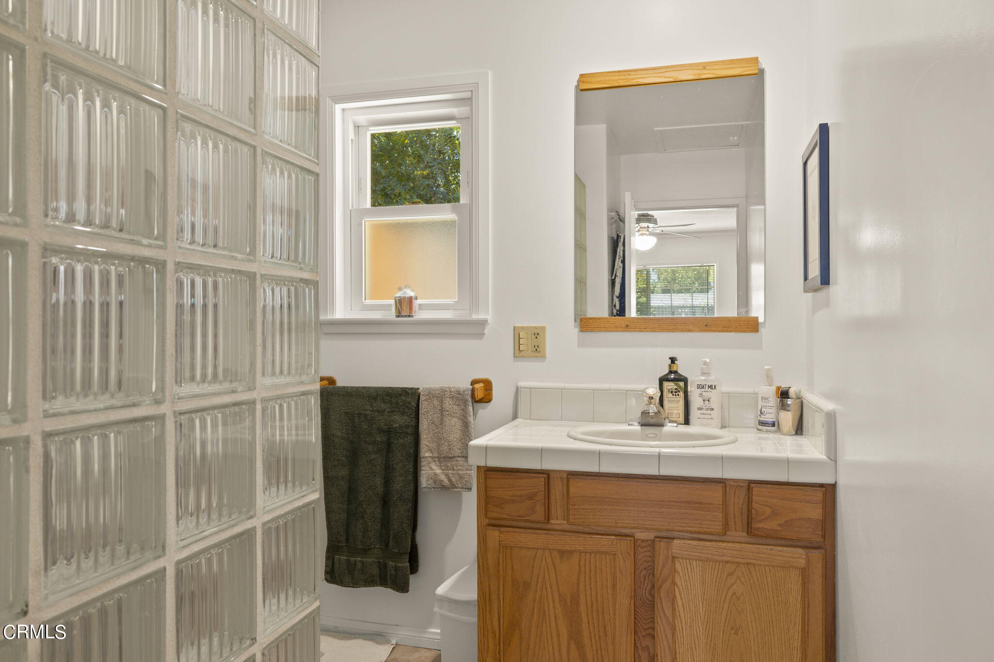 320 Cruzero Street Ojai, CA 93023 - Photo 41 of 48 a bathroom with a sink and a mirror