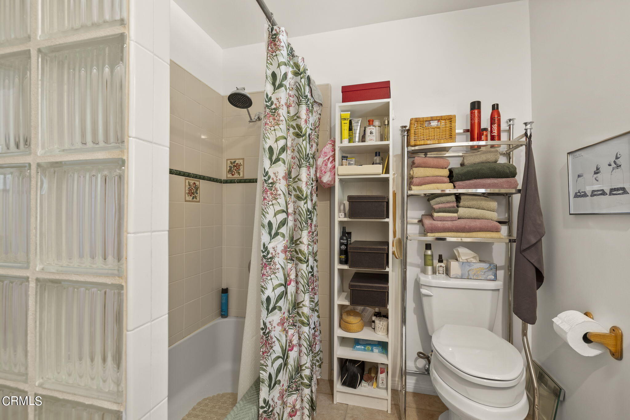 320 Cruzero Street Ojai, CA 93023 - Photo 42 of 48 a bathroom with a toilet and a shower curtain