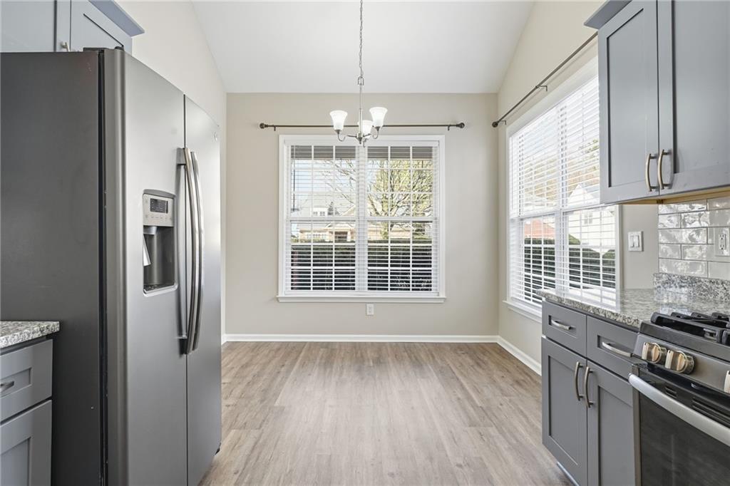1527 Anna Ruby Lane Kennesaw, GA 30152 - Photo 13 of 42 a view of an empty room with a window