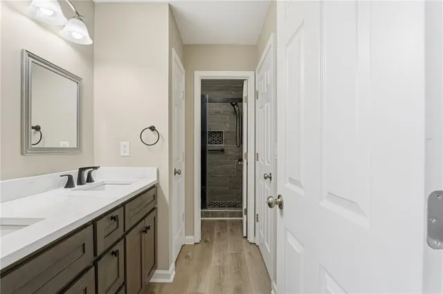 a bathroom with a shower and toilet