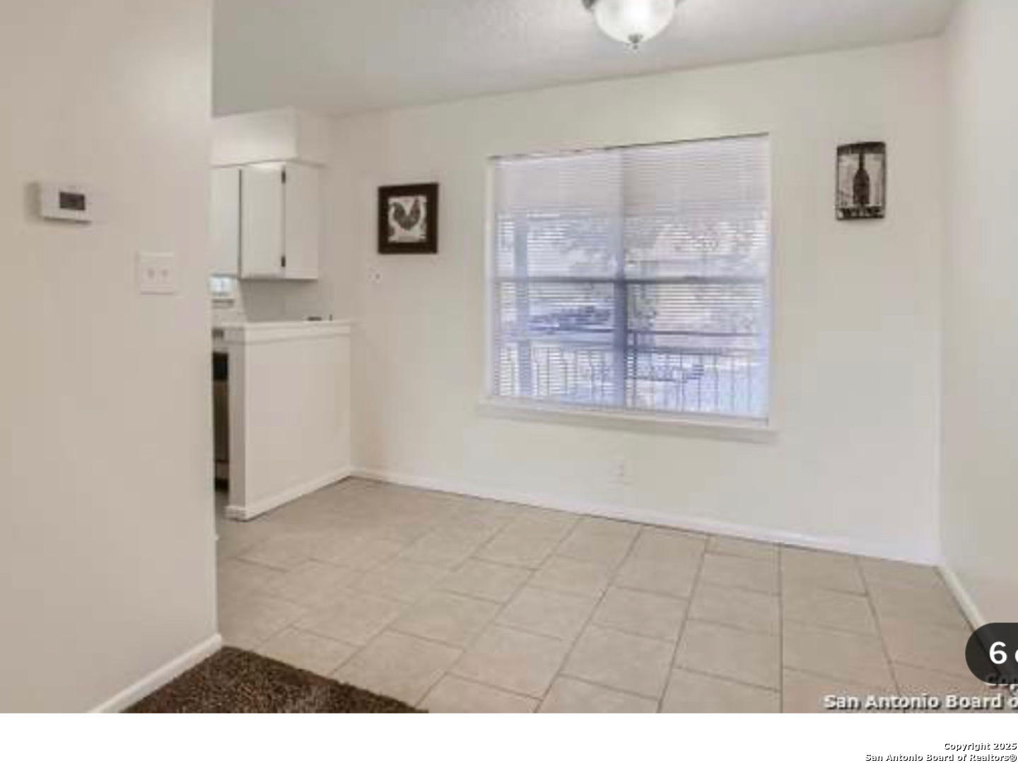923 Vance Jackson Road, Unit 1210 San Antonio, TX 78201 - Photo 4 of 6 a view of an empty room with a window