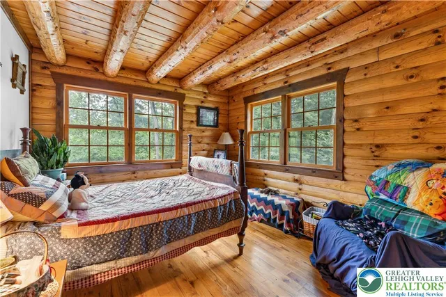 a bathroom with a sink toilet and shower curtain
