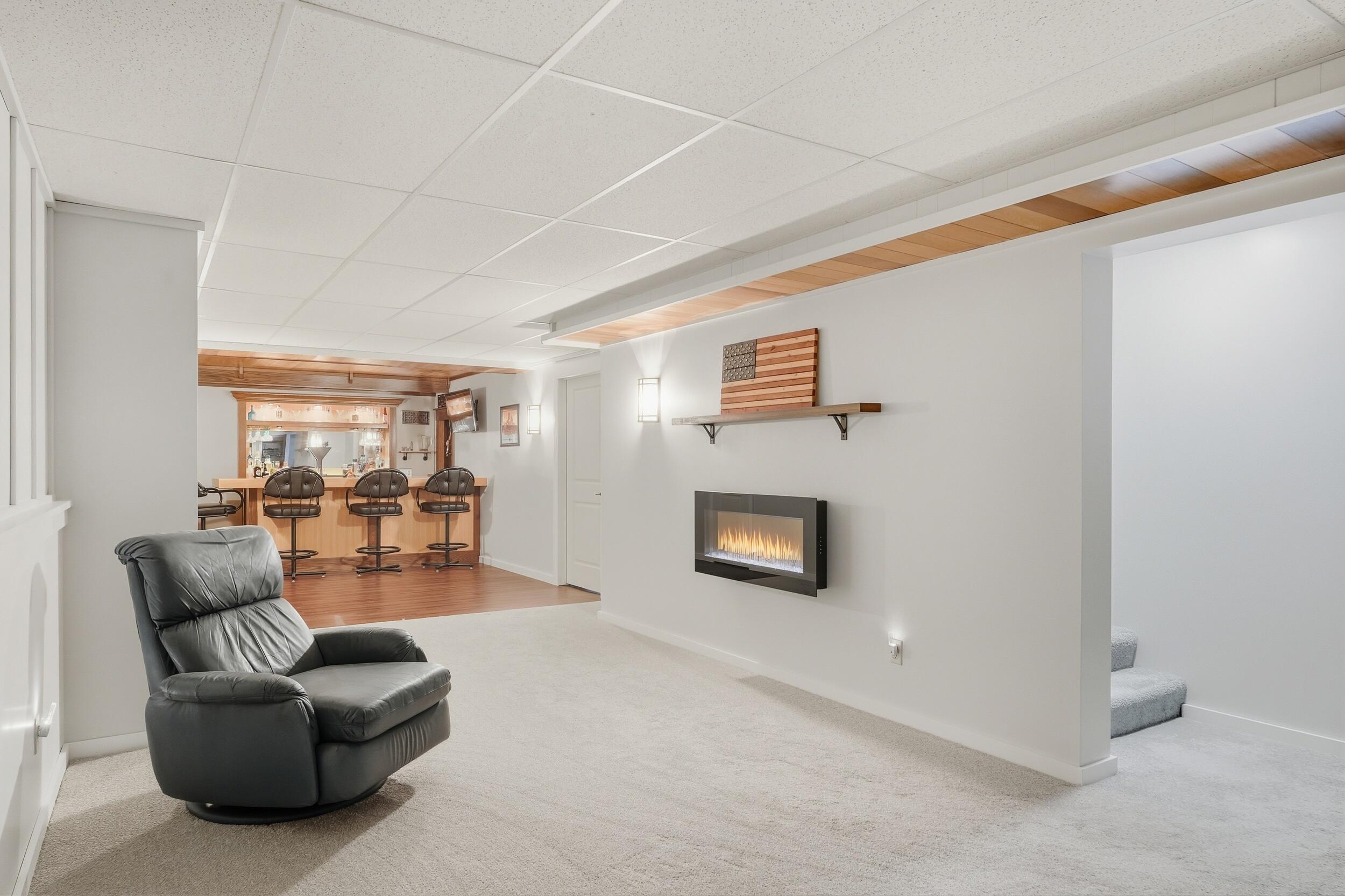 2325 Drop Anchor Drive Crown Point, IN 46307 - Photo 18 of 28 a living room with furniture and a wooden floor