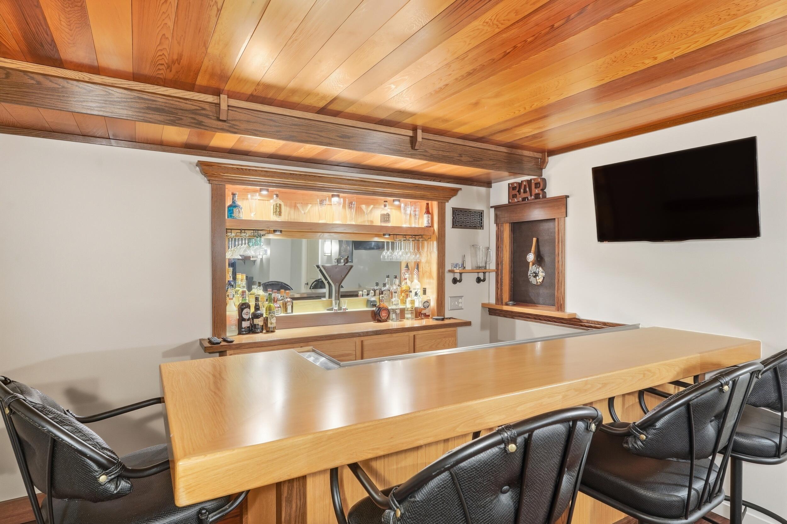 2325 Drop Anchor Drive Crown Point, IN 46307 - Photo 21 of 28 a view of a dining room with furniture and a flat screen tv