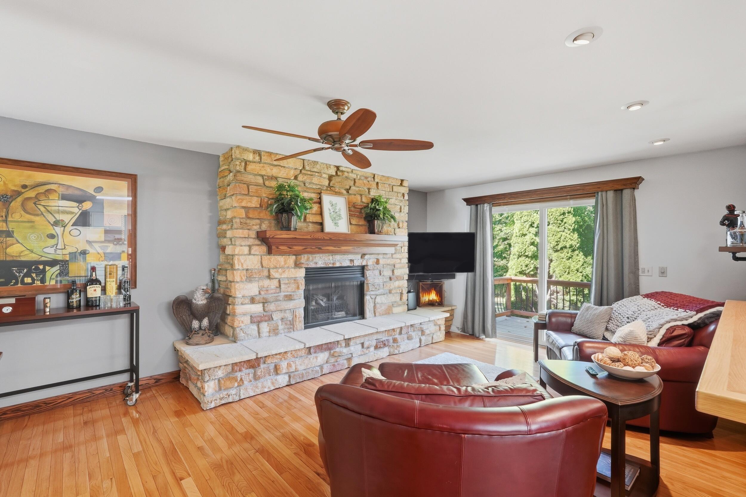 2325 Drop Anchor Drive Crown Point, IN 46307 - Photo 3 of 28 a living room with furniture a fireplace and a flat screen tv