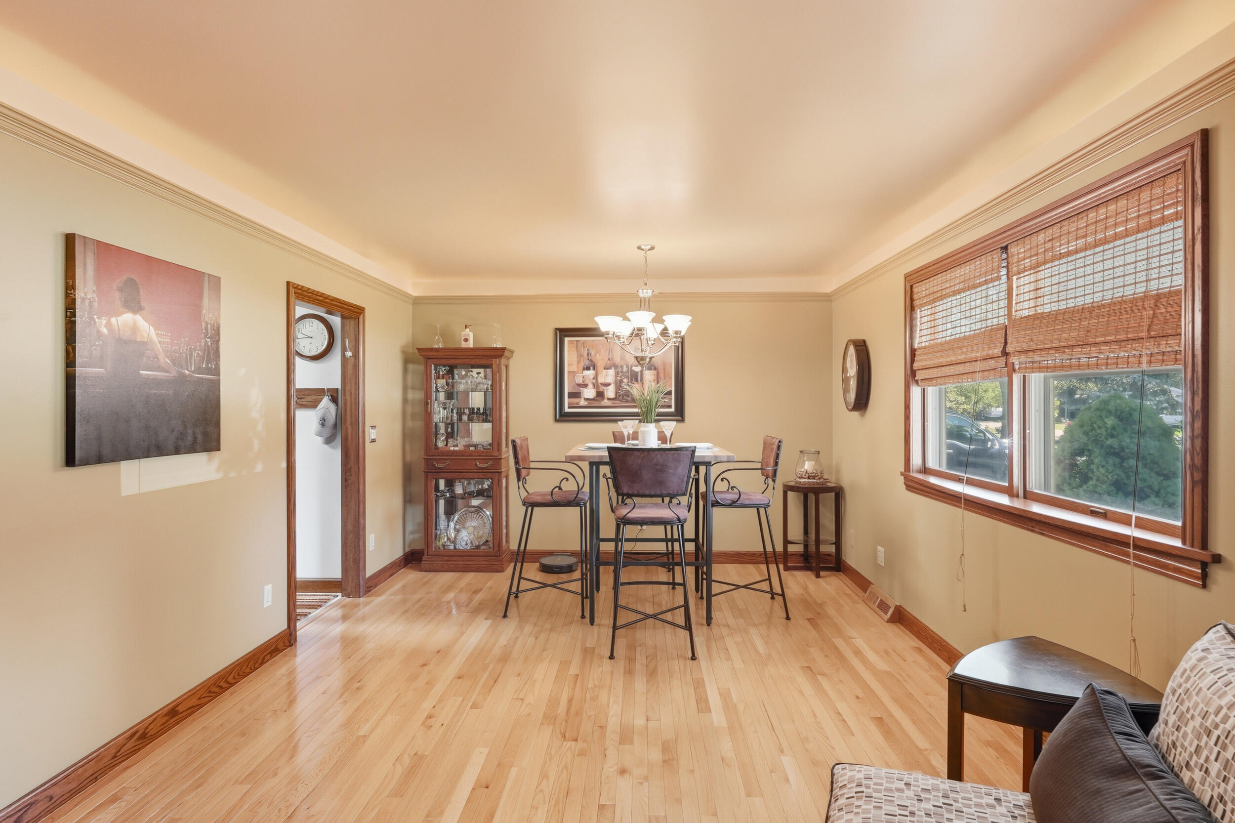 2325 Drop Anchor Drive Crown Point, IN 46307 - Photo 5 of 28 a dining room with wooden floor and stainless steel appliances