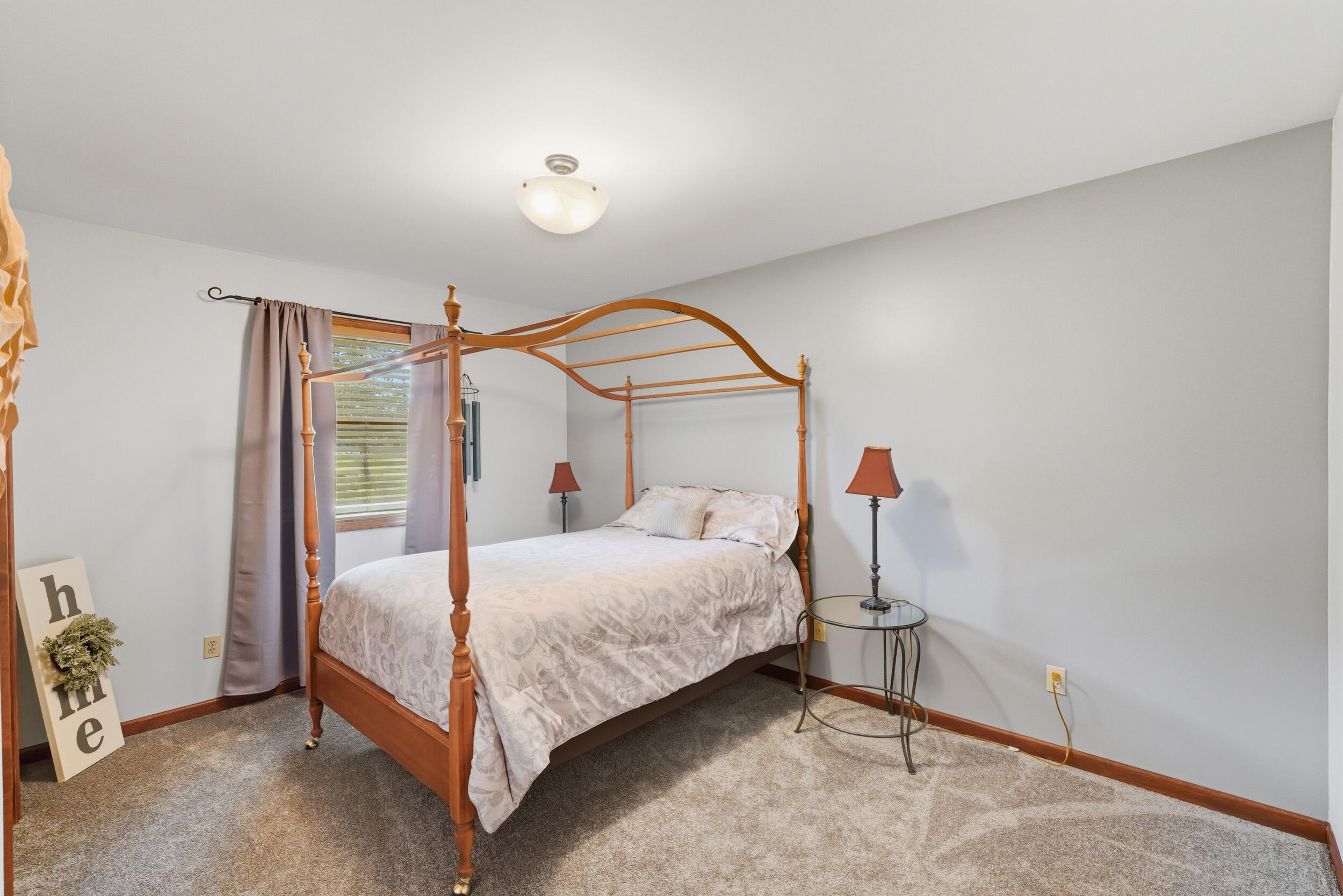 2325 Drop Anchor Drive Crown Point, IN 46307 - Photo 7 of 28 a bedroom with a bed and a mirror
