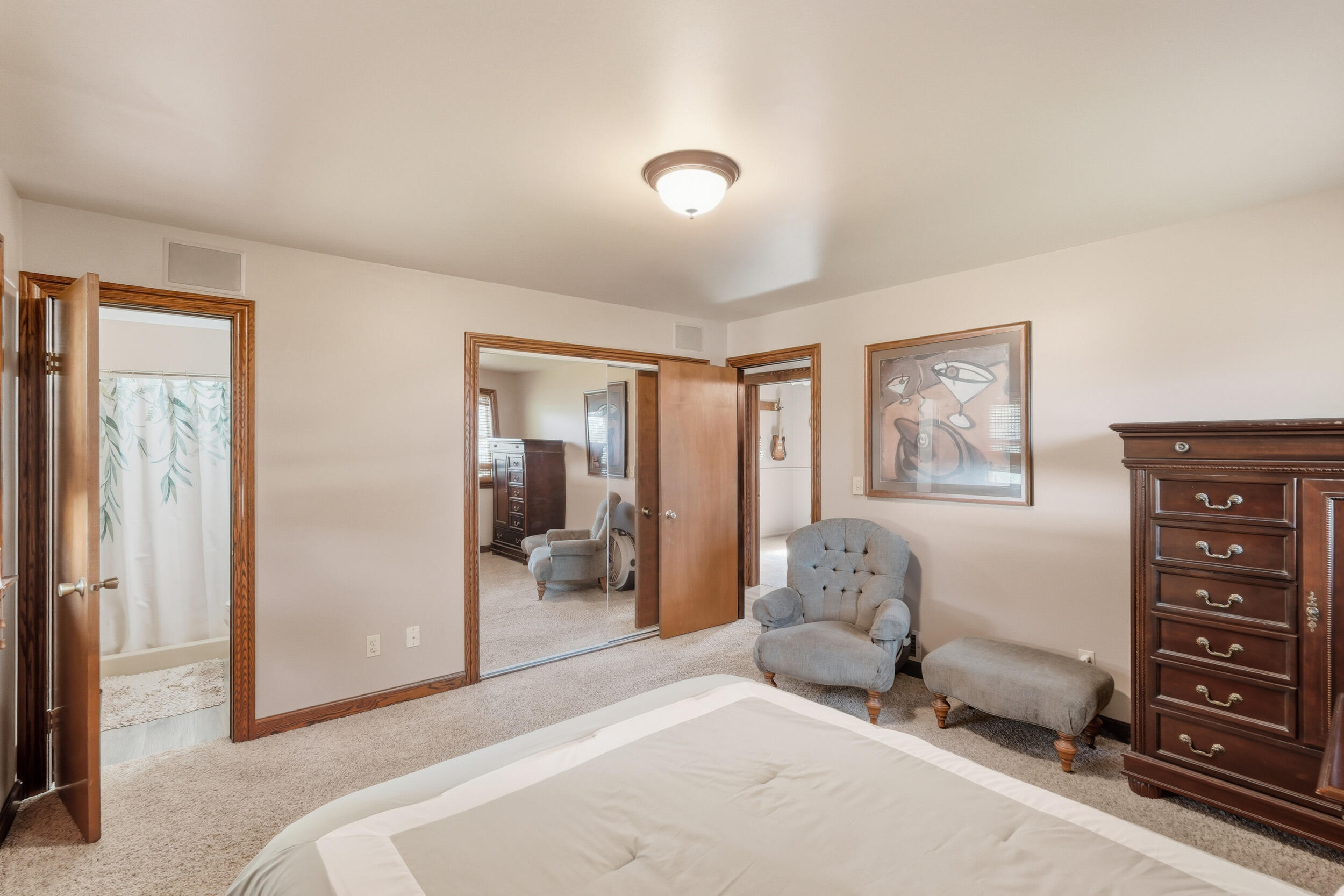 2325 Drop Anchor Drive Crown Point, IN 46307 - Photo 8 of 28 a bedroom with a bed and wooden floor