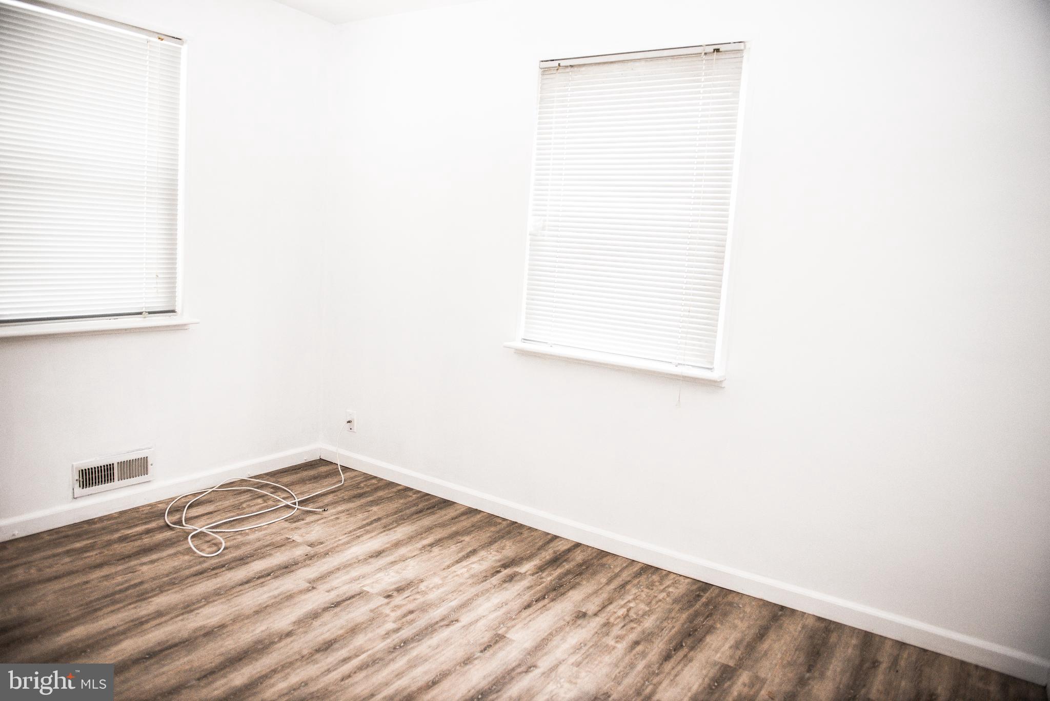 521 Warren Road, Unit 2 Cockeysville, MD 21030 - Photo 13 of 19 a view of a small space with wooden floor