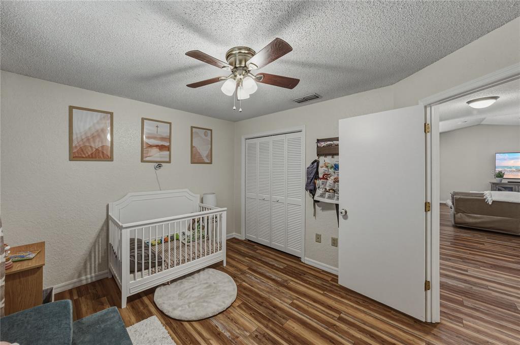 7435 Kilbride Court Weeki Wachee, FL 34613 - Photo 25 of 67 a view of a hallway with workspace and a window