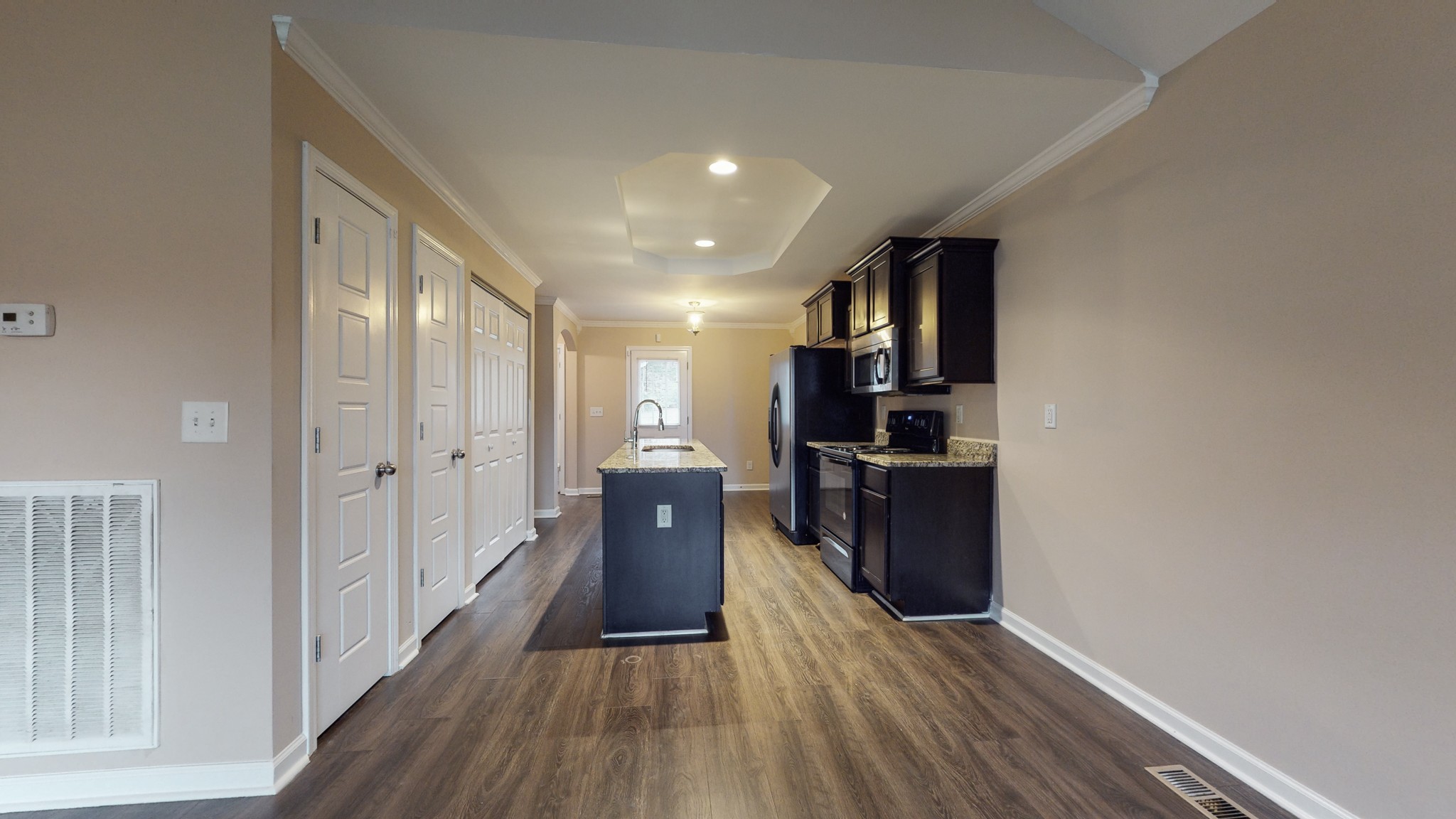 218 Larkin Springs Road Madison, TN 37115 - Photo 4 of 20 a view of a kitchen with a sink refrigerator and wooden floor