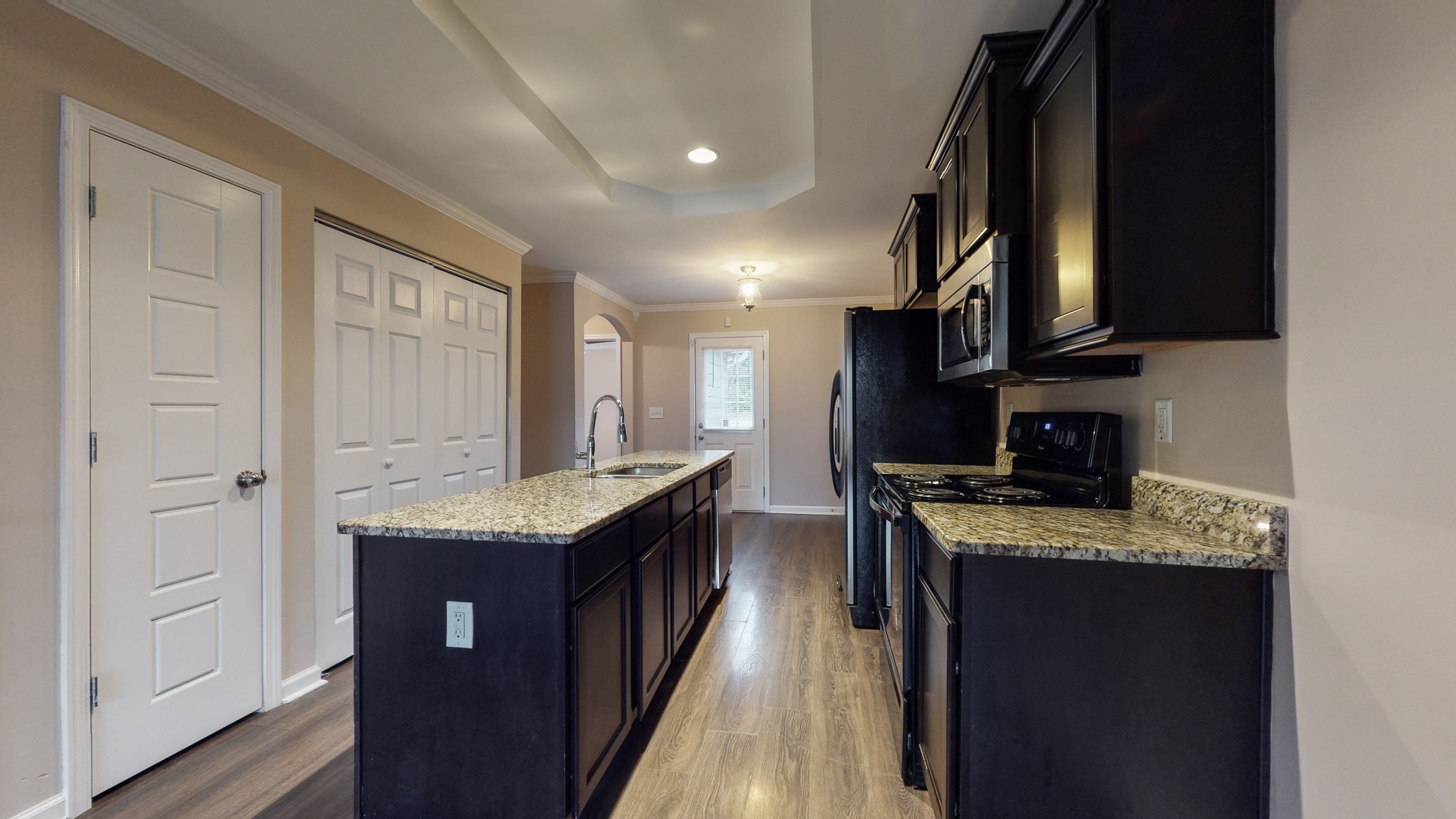 218 Larkin Springs Road Madison, TN 37115 - Photo 5 of 20 a kitchen with stainless steel appliances granite countertop a sink stove and refrigerator