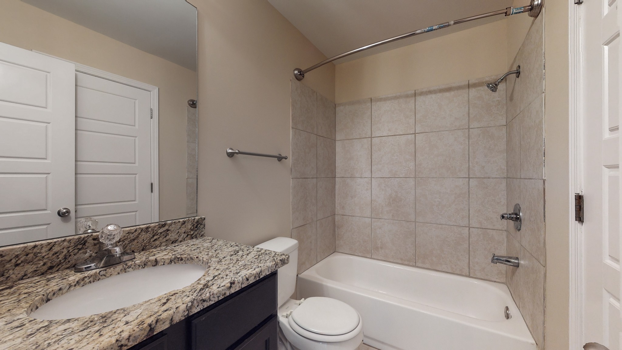 218 Larkin Springs Road Madison, TN 37115 - Photo 10 of 20 a bathroom with a granite countertop sink toilet and shower