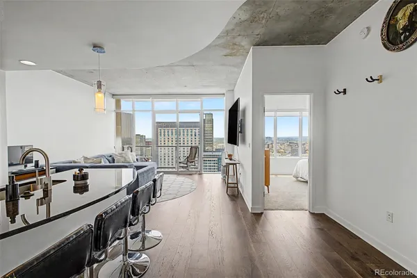 a very nice looking room with wooden floor
