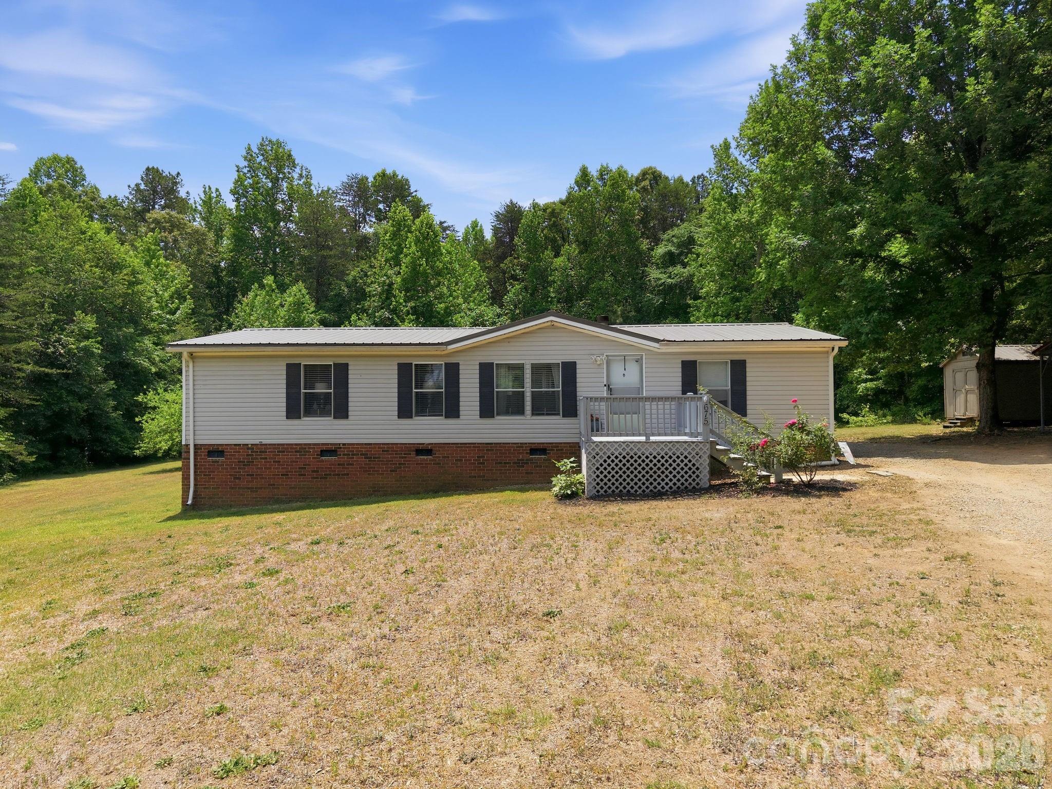 675 Overcash Road Salisbury, NC 28147 - Photo 2 of 48 a view of a house with a yard