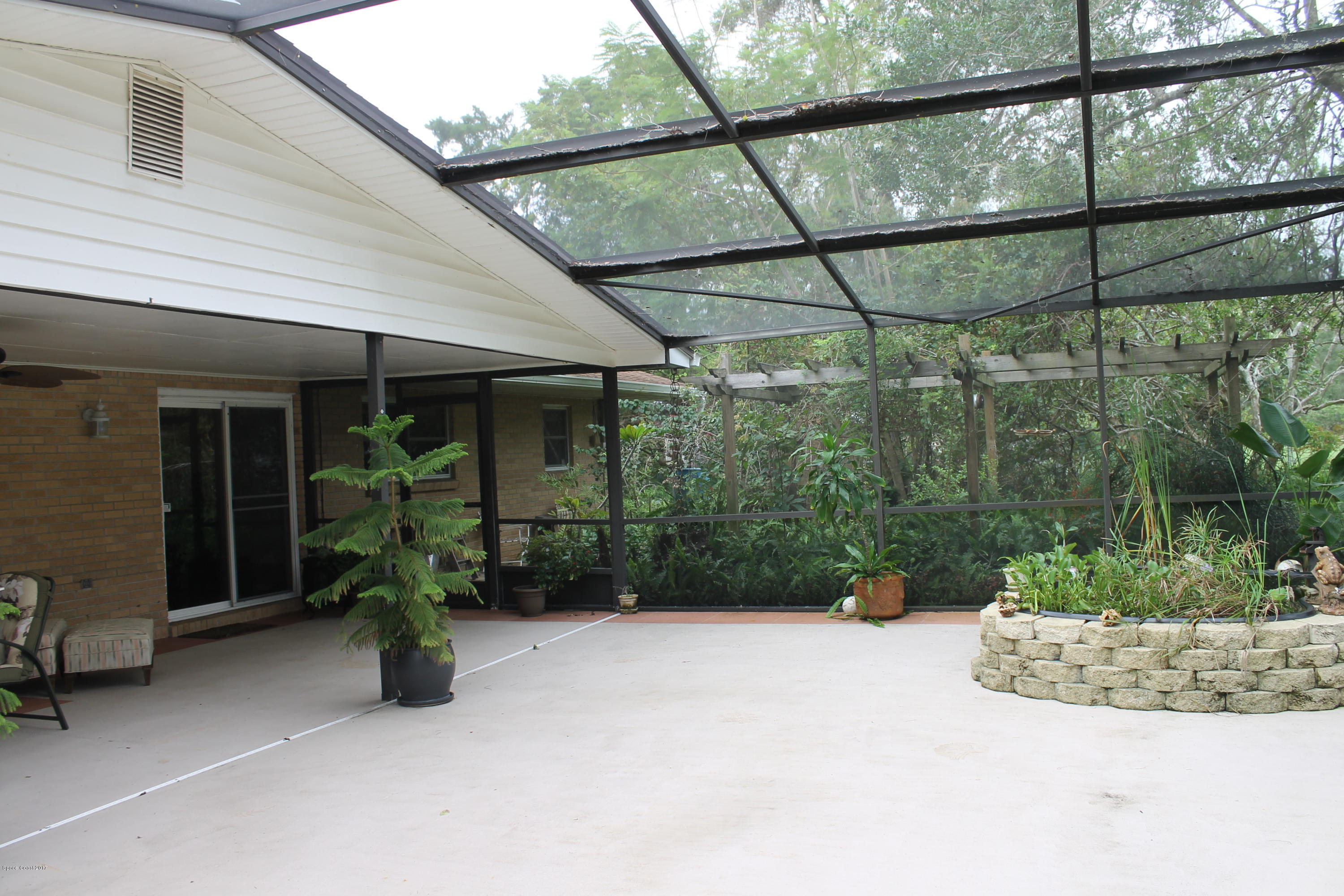 4037 Sterling Street Mims, FL 32754 - Photo 25 of 33 screened patio