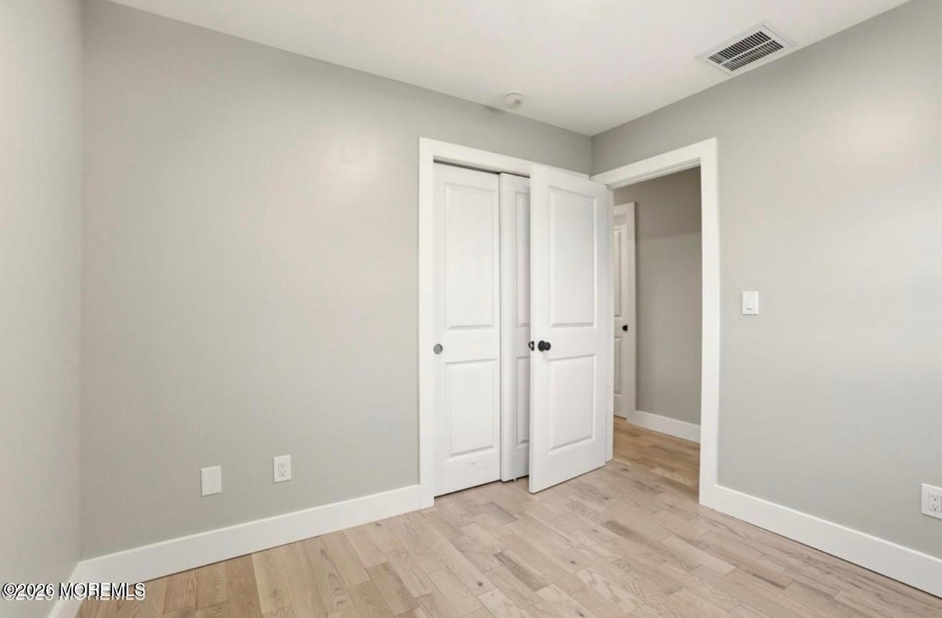 112 Manhattan Street Jackson, NJ 08527 - Photo 19 of 41 a view of an empty room