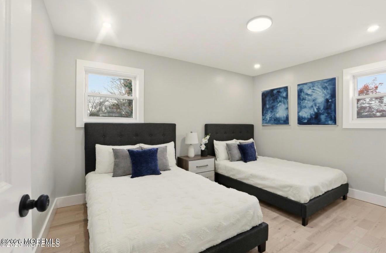 112 Manhattan Street Jackson, NJ 08527 - Photo 20 of 41 a bedroom with two beds and painting on the wall