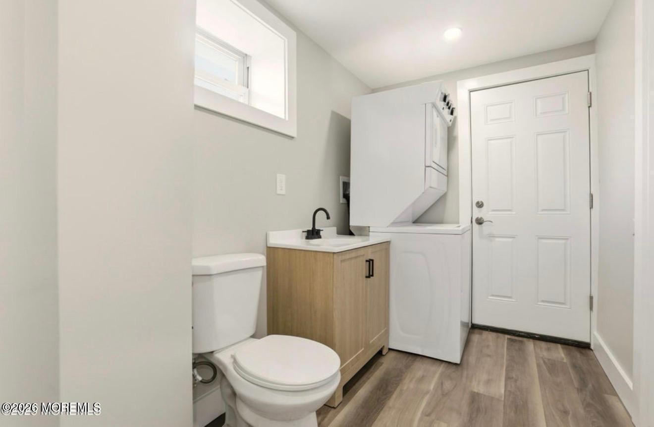 112 Manhattan Street Jackson, NJ 08527 - Photo 23 of 41 a bathroom with a sink a toilet and a mirror