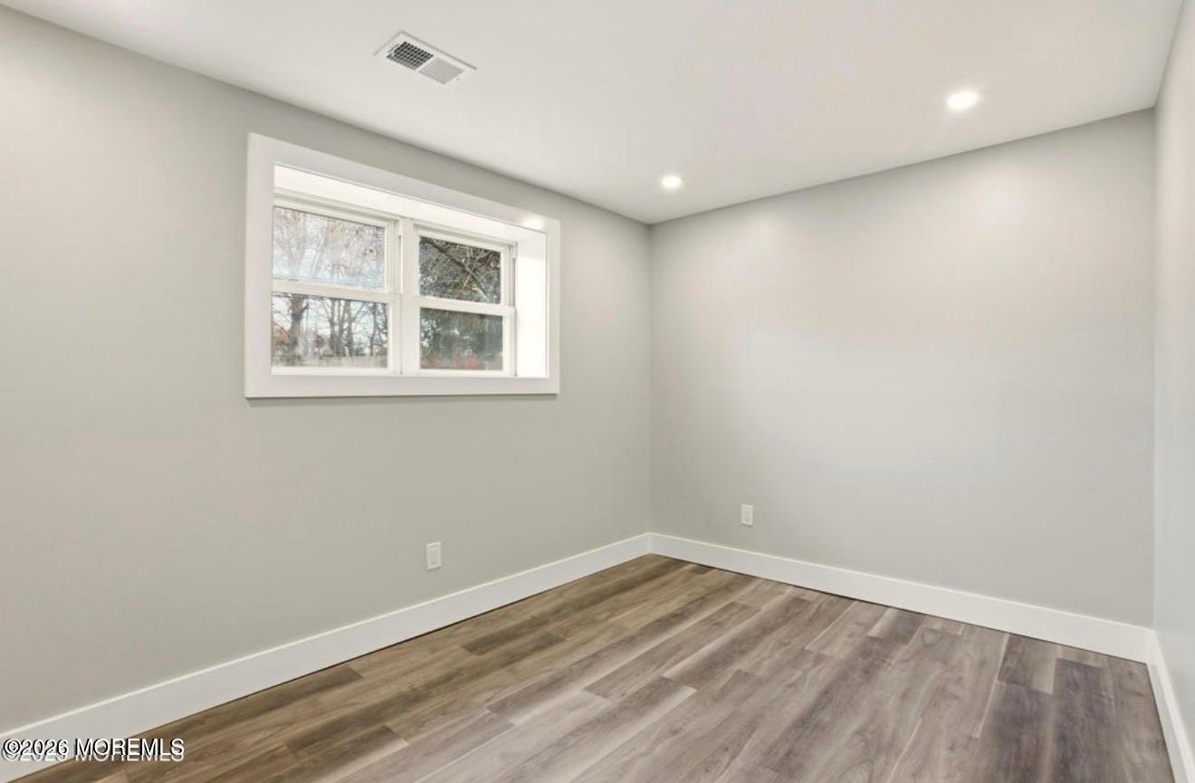 112 Manhattan Street Jackson, NJ 08527 - Photo 26 of 41 an empty room with a window