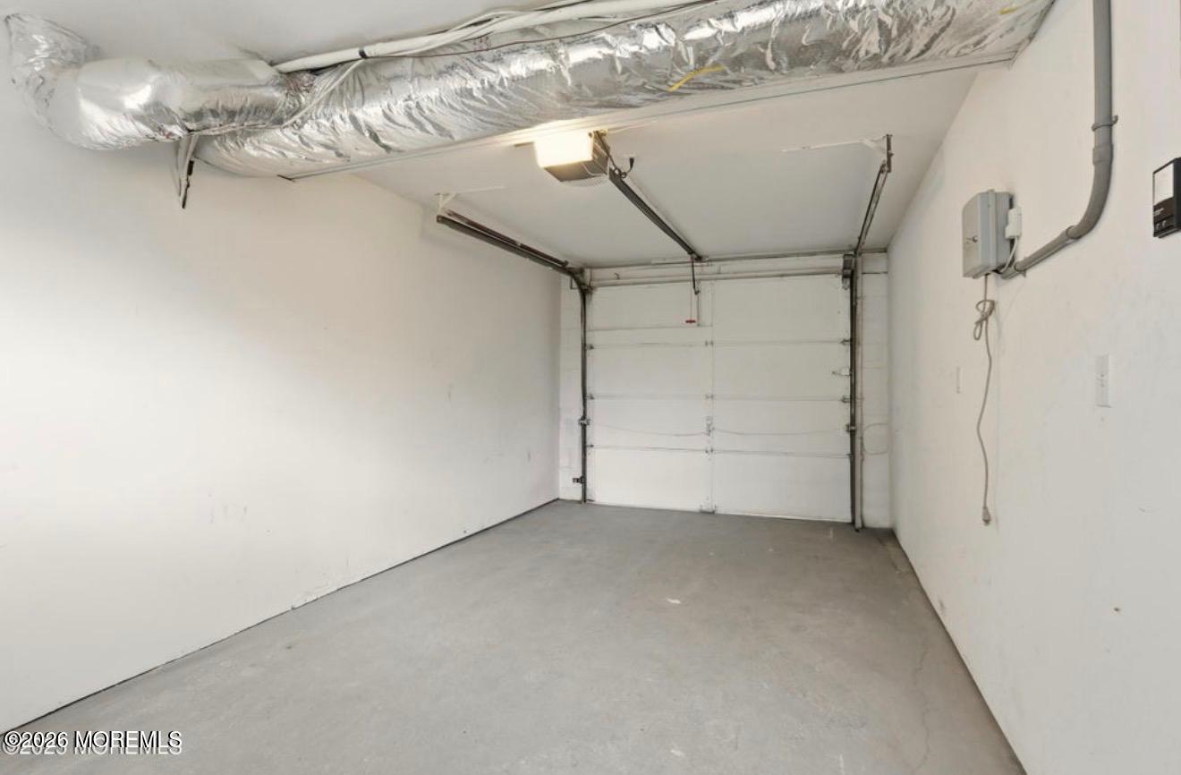 112 Manhattan Street Jackson, NJ 08527 - Photo 32 of 41 a view of a room with racks on the wall