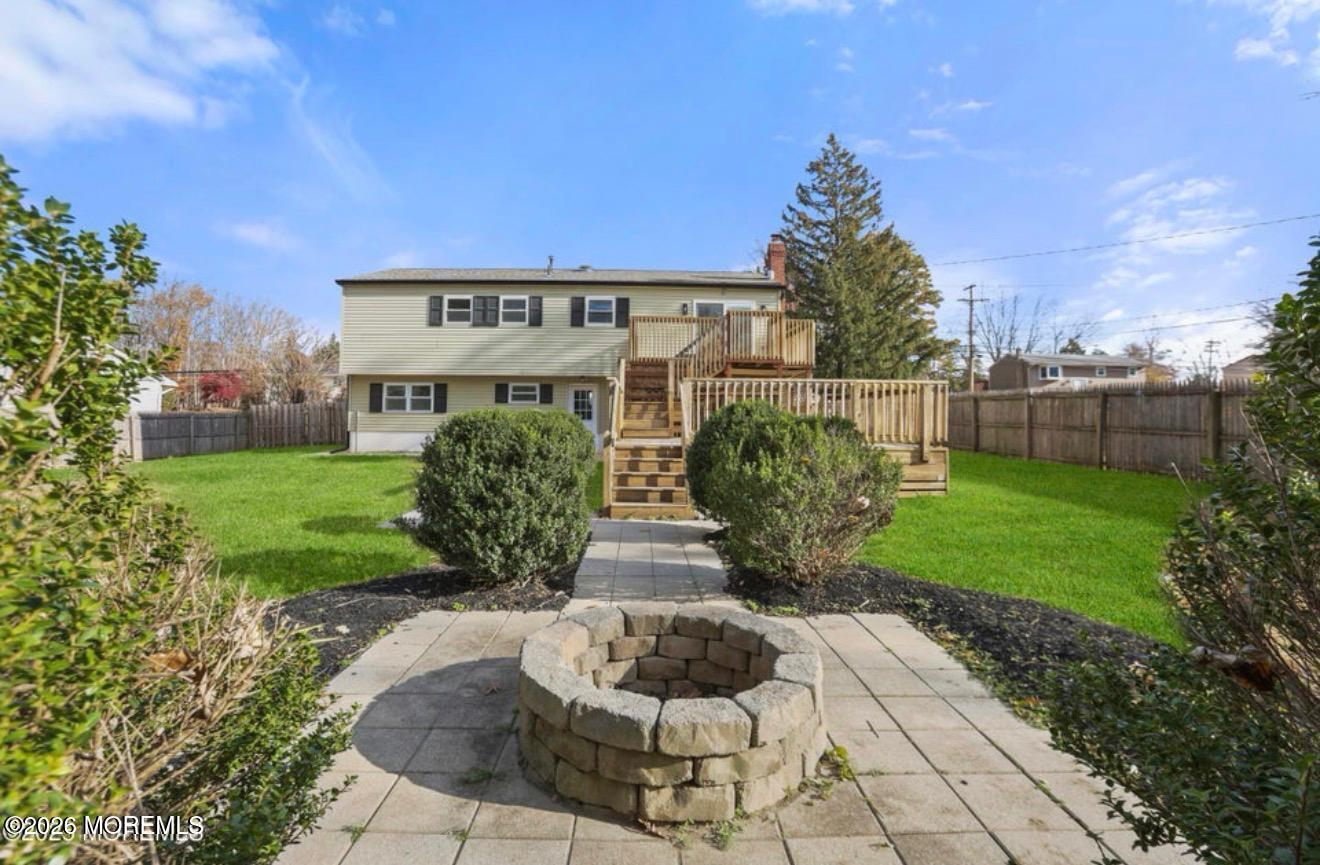 112 Manhattan Street Jackson, NJ 08527 - Photo 33 of 41 a view of a house with yard and a garden