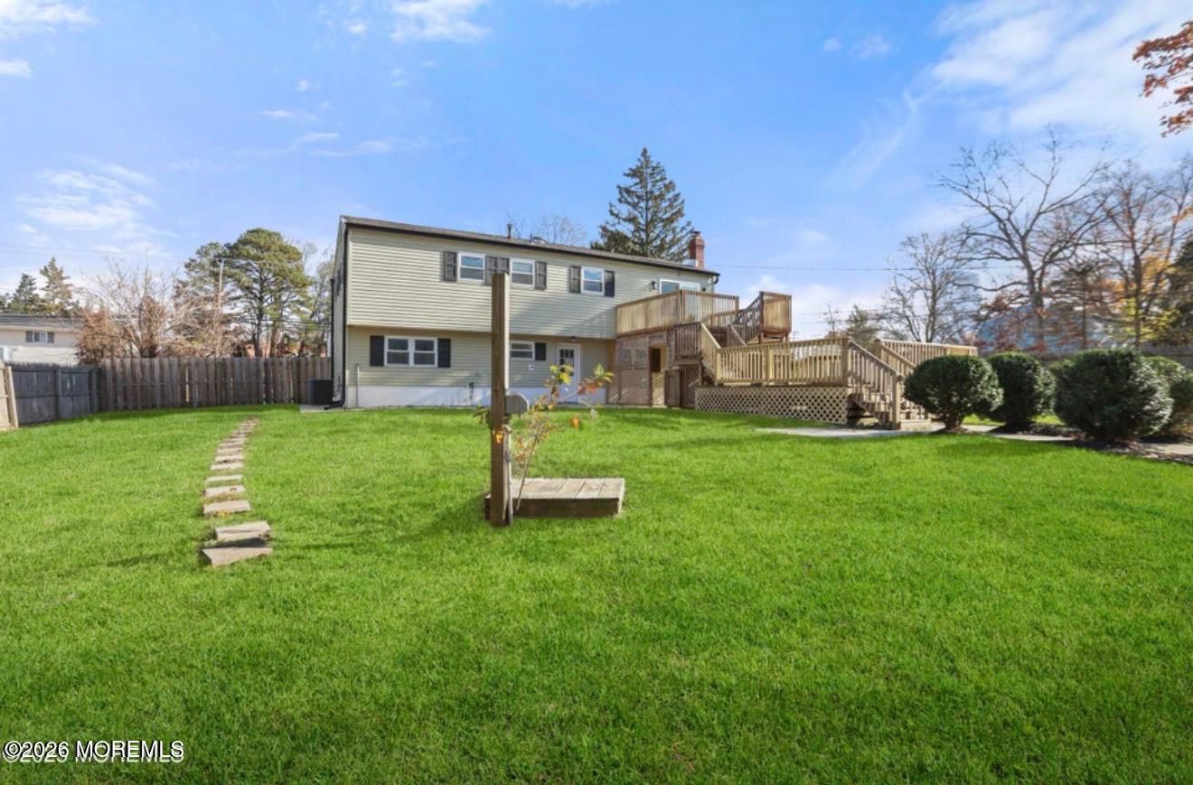112 Manhattan Street Jackson, NJ 08527 - Photo 40 of 41 a view of a house with a yard and sitting area
