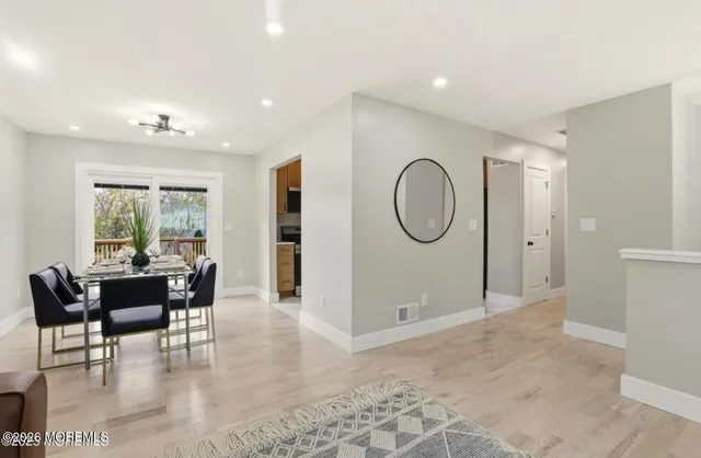 a view of a livingroom with furniture and window