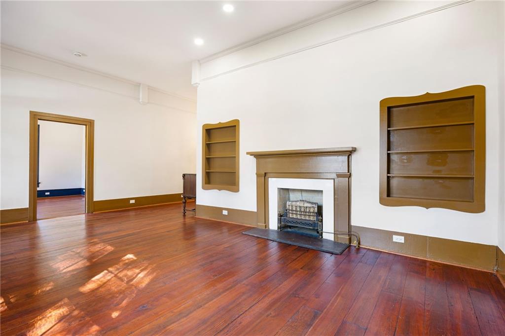 4284 Marietta Street Powder Springs, GA 30127 - Photo 11 of 70 a view of a livingroom with wooden floor and a fireplace
