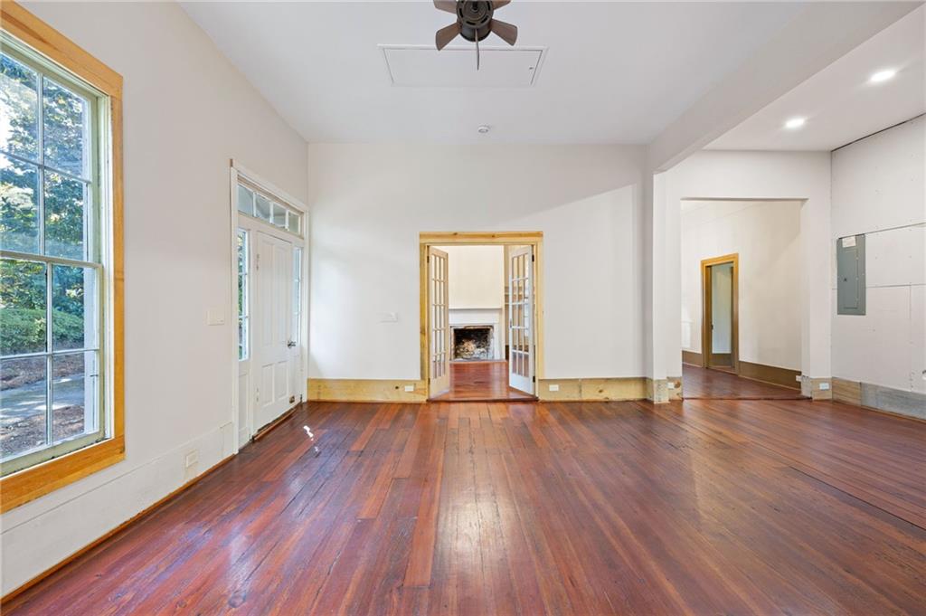 4284 Marietta Street Powder Springs, GA 30127 - Photo 25 of 70 a view of an empty room with wooden floor and a window