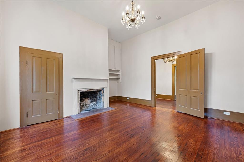 4284 Marietta Street Powder Springs, GA 30127 - Photo 28 of 70 a view of a livingroom with wooden floor and a fireplace