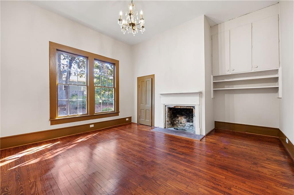 4284 Marietta Street Powder Springs, GA 30127 - Photo 29 of 70 a view of an empty room with a window and fireplace