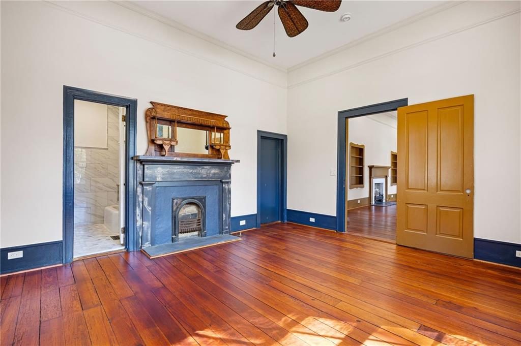 4284 Marietta Street Powder Springs, GA 30127 - Photo 35 of 70 a view of empty room with wooden floor and fireplace