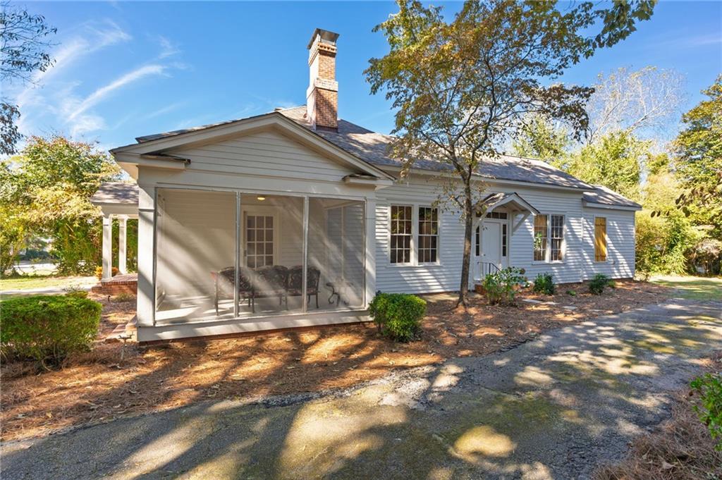 4284 Marietta Street Powder Springs, GA 30127 - Photo 48 of 70 a view of a house with a yard
