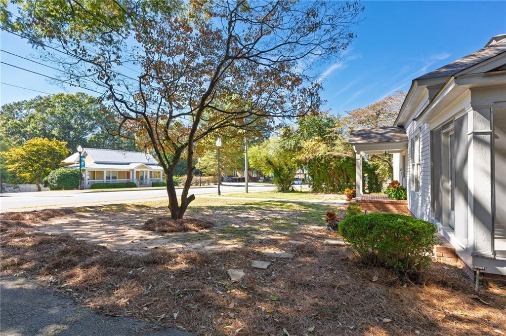 4284 Marietta Street Powder Springs, GA 30127 - Photo 49 of 70 a view of a yard with plants and trees