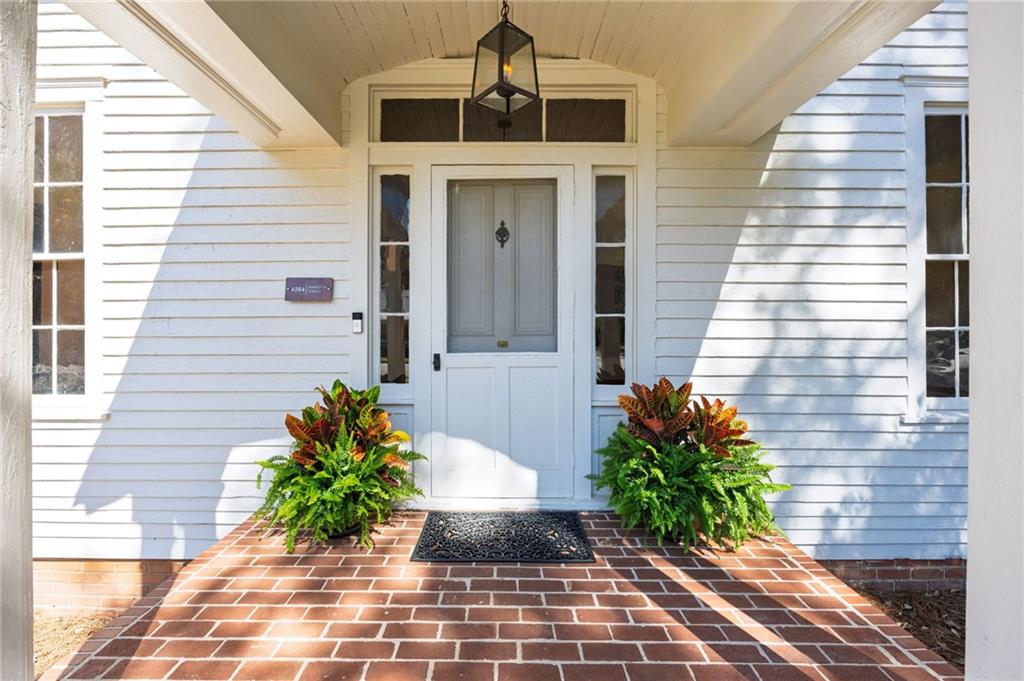 4284 Marietta Street Powder Springs, GA 30127 - Photo 5 of 70 a front view of a house with a yard