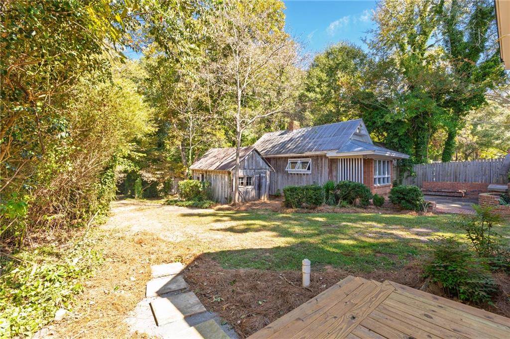 4284 Marietta Street Powder Springs, GA 30127 - Photo 53 of 70 a front view of a house with a yard