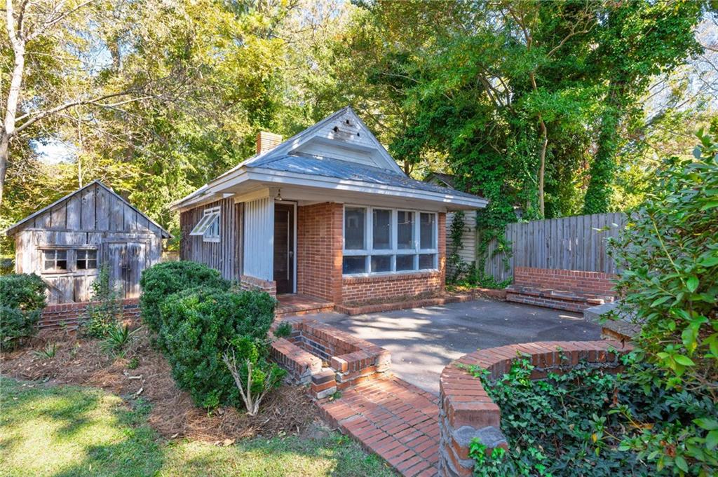 4284 Marietta Street Powder Springs, GA 30127 - Photo 55 of 70 a backyard of a house with seating space