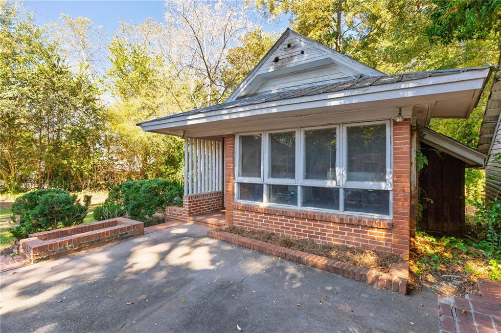 4284 Marietta Street Powder Springs, GA 30127 - Photo 56 of 70 a view of a house with a yard