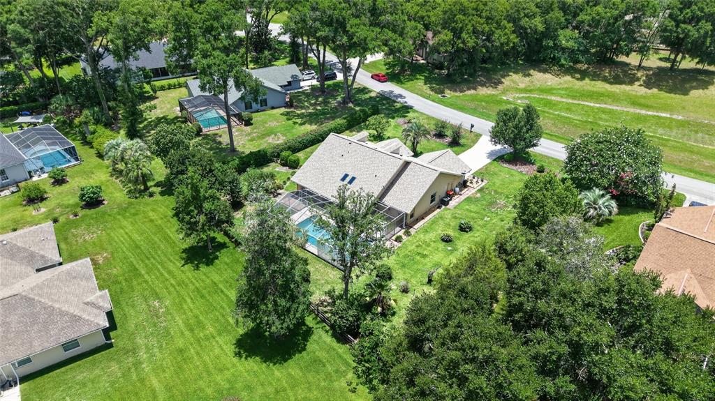 19025 Southwest 98th Loop Dunnellon, FL 34432 - Photo 68 of 80 an aerial view of residential house with outdoor space and trees all around