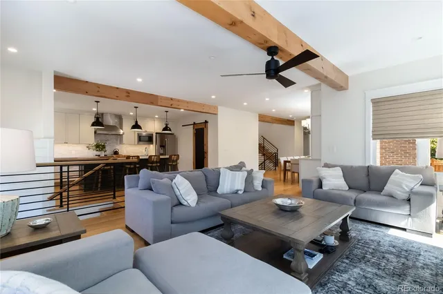 a kitchen with a sink a stove and cabinets