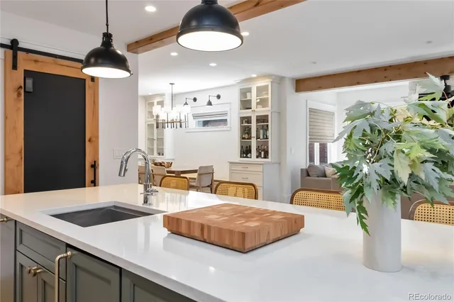 a room with a table and chairs