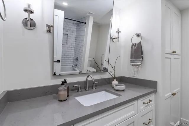 a view of a room that has a table and chairs in it