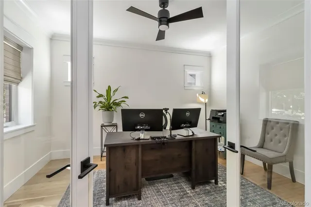 a view of a workspace with furniture